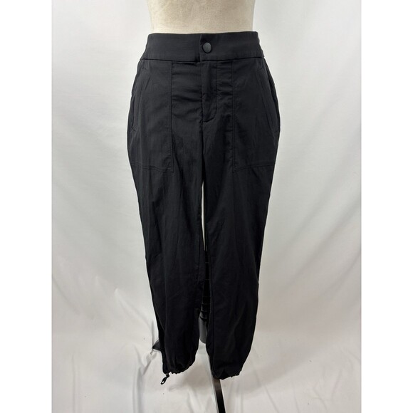 Athleta Trekkie Hike Pant Black 8 Pockets Drawstring Ankles Ripstop Zip Pockets - Picture 2 of 13
